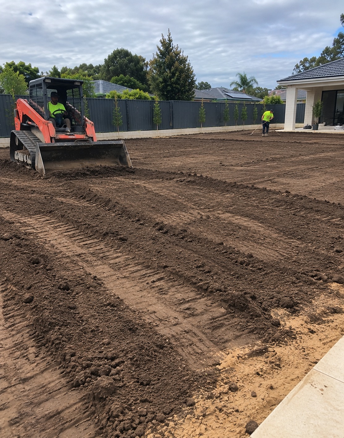 Yard being levelled before turf installation in Perth
